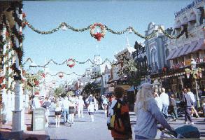 Christmastime on Main Street U.S.A. garlands and wreaths and bells oh my.